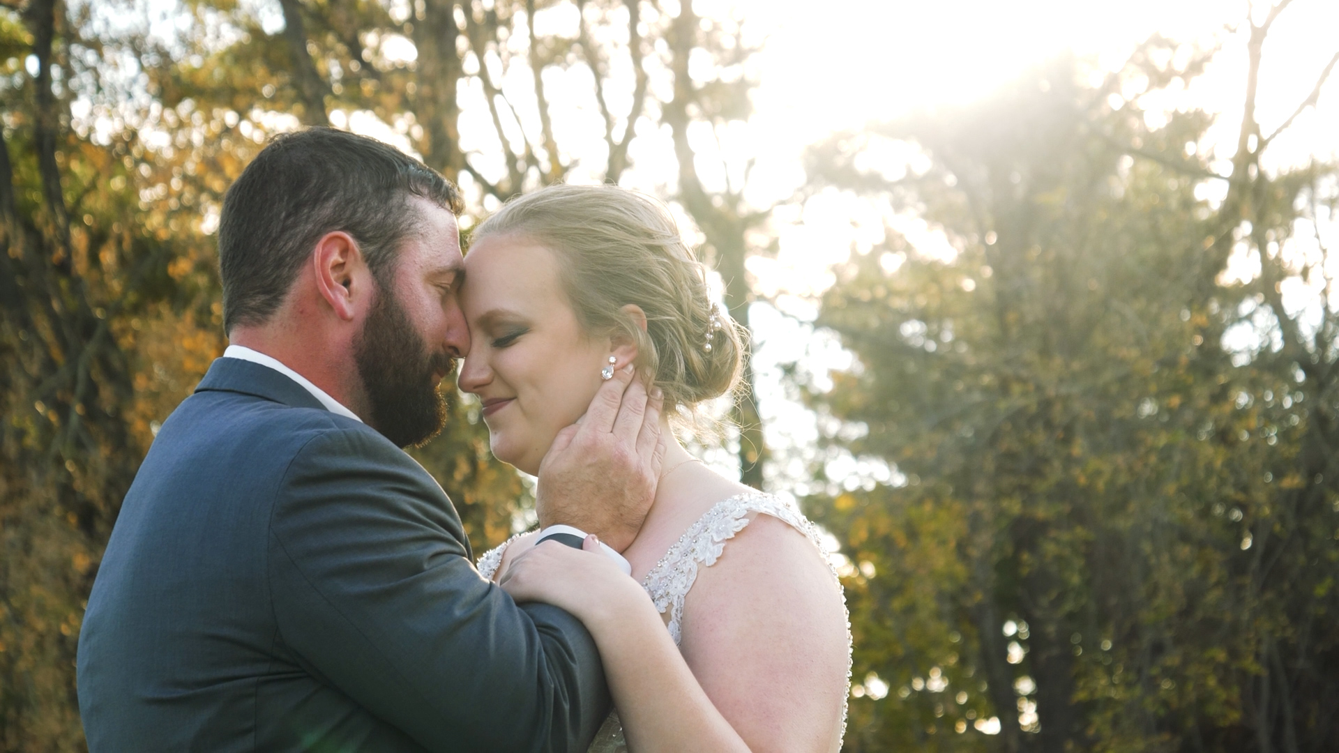 Newlyweds together in the evening light